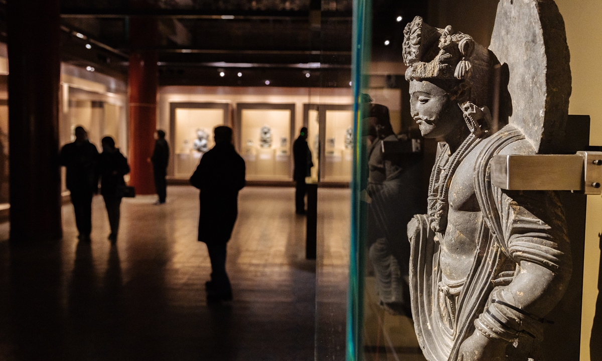 A statue of a Bodhisattva from the 2nd and 3rd centuries AD is on display in the exhibition hall. Photo: Li Hao/GT