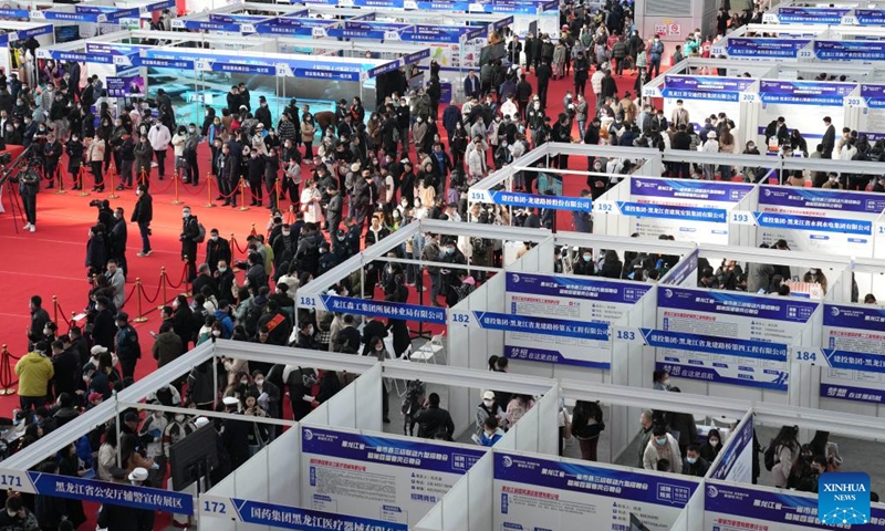 This photo taken on March 18, 2023 shows a view of a job fair in Harbin, northeast China's Heilongjiang Province. More than 500 on-line and off-line recruiting events have been scheduled during this job fair, the largest of its kind in recent years held in the province, offering over 115,000 vacant positions in total. (Photo:Xinhua)