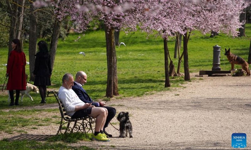 People enjoy leisure time in Villa Ada park in Rome, Italy, on March 18, 2023. (Photo:Xinhua)