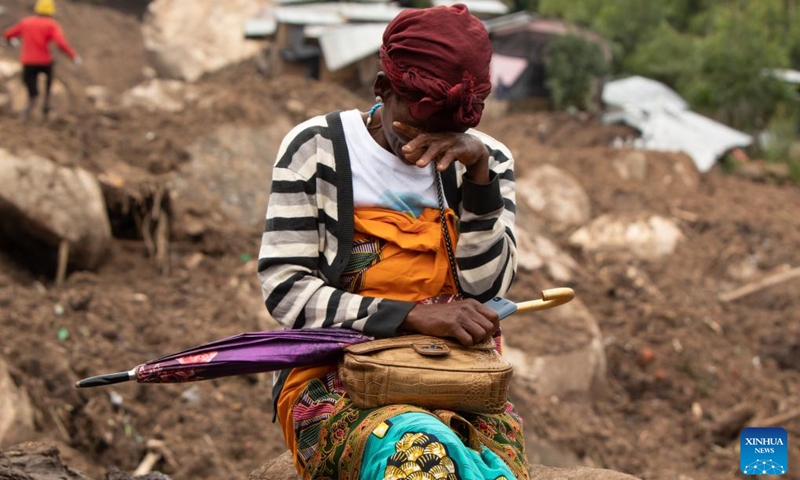 A woman weeps at a cyclone-affected area in Blantyre, Malawi, March 17, 2023. More bodies have been recovered in Malawi's southern region hit by Cyclone Freddy, bringing the total death toll to at least 438 as of 09:00 p.m. local time (1900 GMT) Friday, said the country's Department of Disaster Management Affairs. The death toll rose from Thursday's 326, said the department in its fifth update. (Photo:Xinhua)