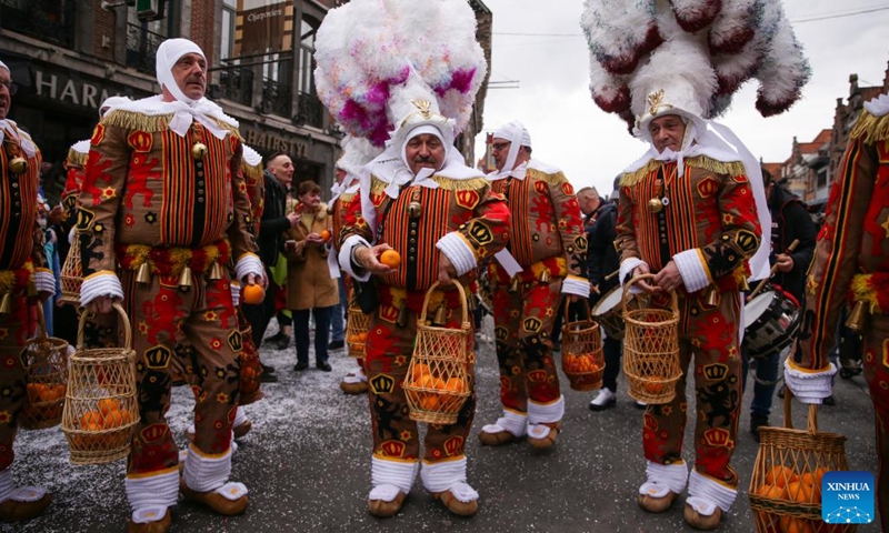 Participants attend a carnival in Tournai, Belgium, March 18, 2023. The carnival, which will be held here from March 16 to 19, has attracted many participants and visitors with various activities. (Photo:Xinhua)