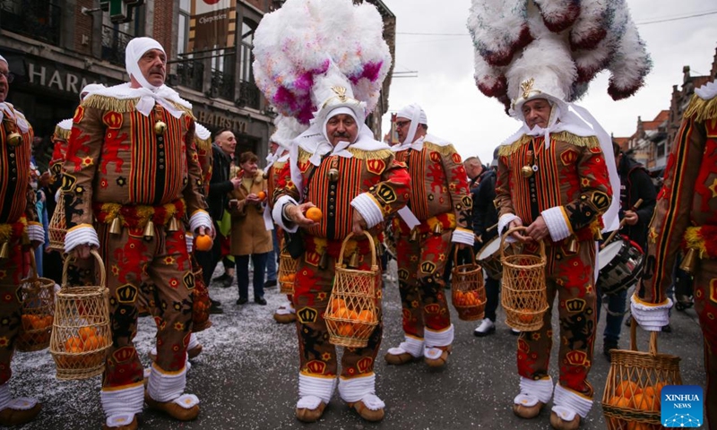 Participants attend a carnival in Tournai, Belgium, March 18, 2023. The carnival, which will be held here from March 16 to 19, has attracted many participants and visitors with various activities. (Xinhua/Zheng Huansong)