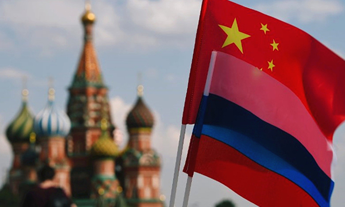 The national flags of China and Russia are seen on Red Square, Moscow. Photo: Xinhua