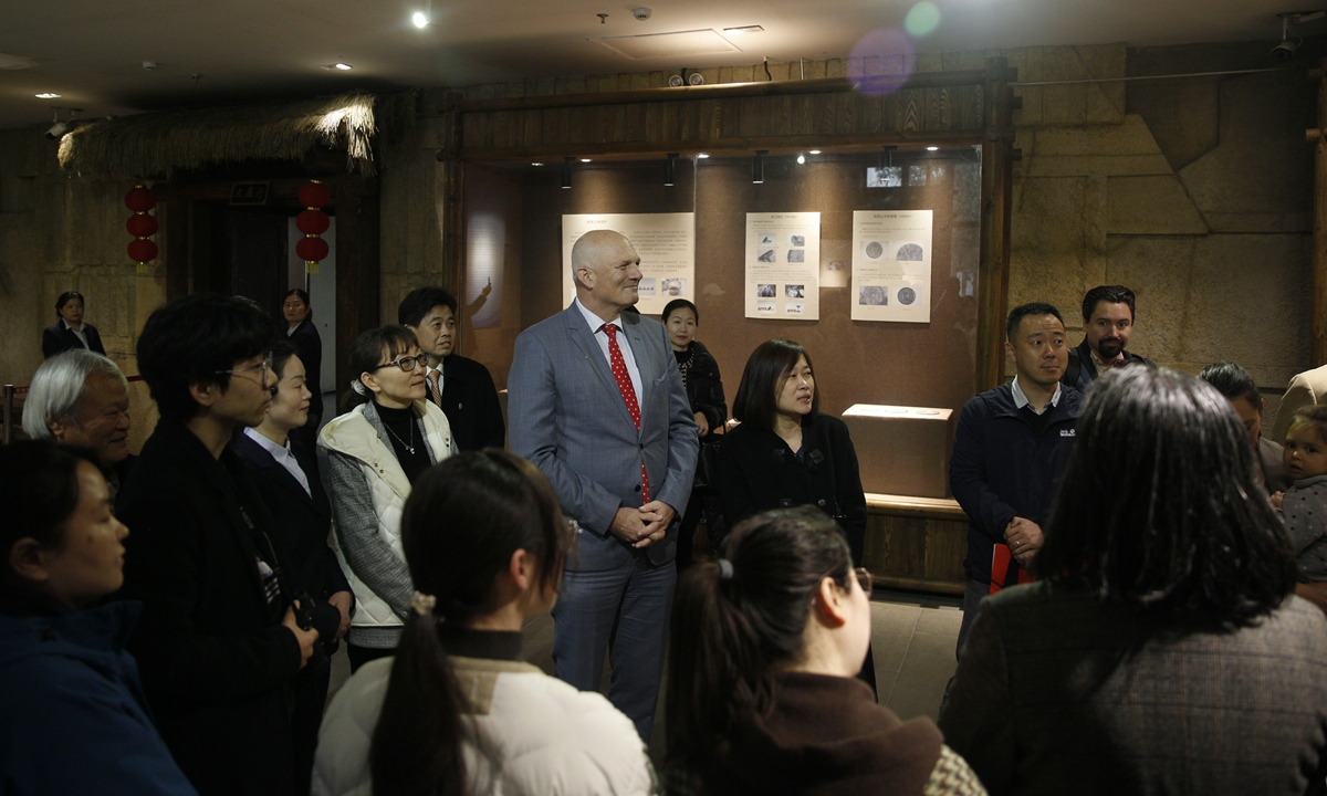 Swiss Ambassador to China Jürg Burri visits the exhibition of the restored artifacts on March 17, 2023.  Photo: Courtesy of Ma Jingyu