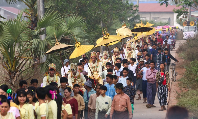 The Shinbyu novitiation ceremony is held in Dala township of Yangon, Myanmar, on March 19, 2023.(Photo: Xinhua)