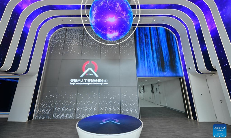 This photo taken on March 20, 2023 shows a view of Tianjin Artificial Intelligence Computing Center in north China's Tianjin. The Tianjin Artificial Intelligence Computing Center was inaugurated in Tianjin recently. The first batch of 100 petaflops of computing power has been fully loaded and put into operation, and an additional 200 petaflops will be added in the future, providing inclusive public computing services for artificial intelligence (AI) application enterprises, universities and scientific research institutions.(Photo: Xinhua)