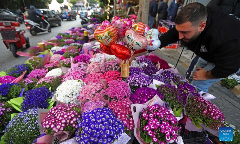 A flower seller prepares for Mother's Day in Beirut, Lebanon, March 20, 2023. The locals celebrate Mother's Day on March 21.(Photo: Xinhua)