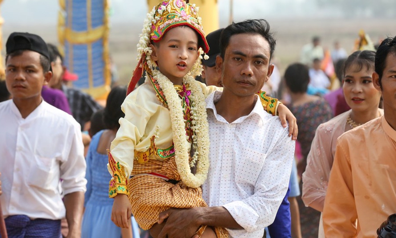 A boy in traditional attire attends the Shinbyu novitiation ceremony in Dala township of Yangon, Myanmar, on March 19, 2023.(Photo: Xinhua)