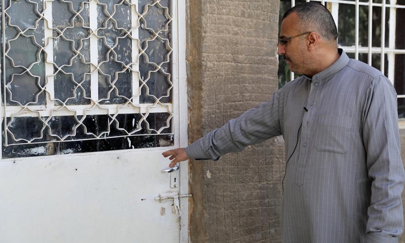 Khalid Salman Rasif recalls how U.S. soldiers stormed the homes of his relatives in Haditha of Iraq's Anbar province, March 7, 2023.(Photo: Xinhua)