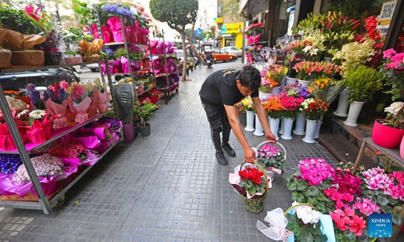 A flower seller prepares for Mother's Day in Beirut, Lebanon, March 20, 2023. The locals celebrate Mother's Day on March 21.(Photo: Xinhua)