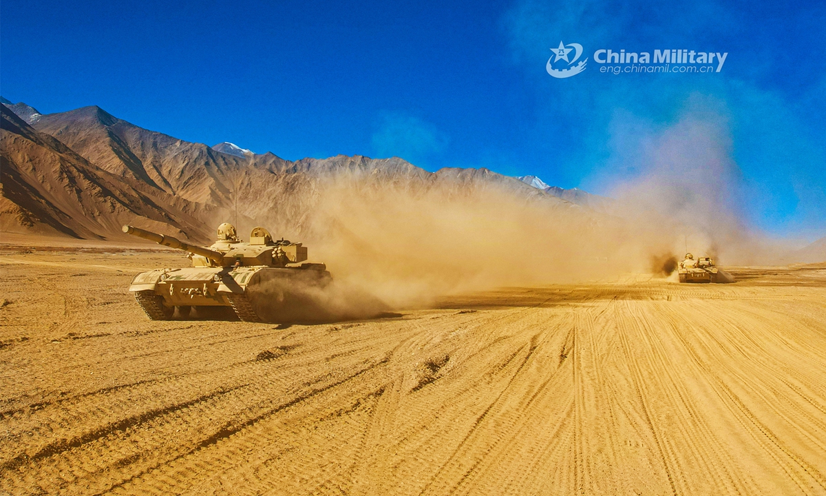 Main battle tanks attached to a tank element under the PLA 77th Group Army rumble in speed during a field training exercise in northwest China’s Gobi desert in mid March, 2023. (eng.chinamil.com.cn/Photo by Xue Zongyan and Liu Shanlin)