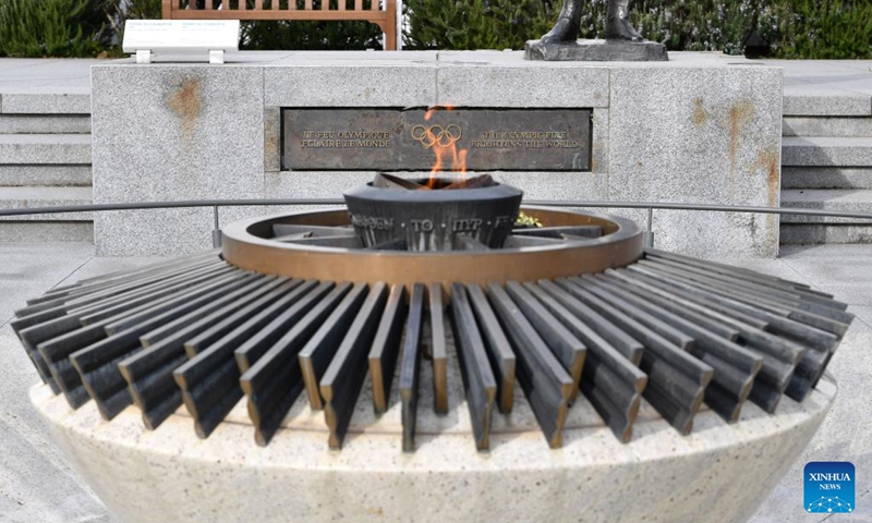 A burning fire symbolizing the Olympic flame is seen at the International Olympic Museum in Lausanne, Switzerland, March 21, 2023. (Xinhua/Lian Yi)