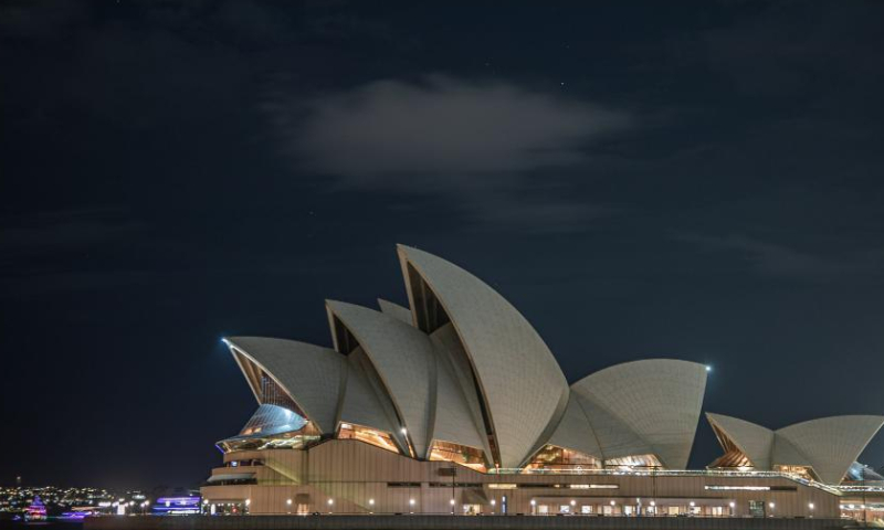 The Sydney Opera House goes dark during the Earth Hour event in Sydney, Australia, March 25, 2023. Photo:Xinhua