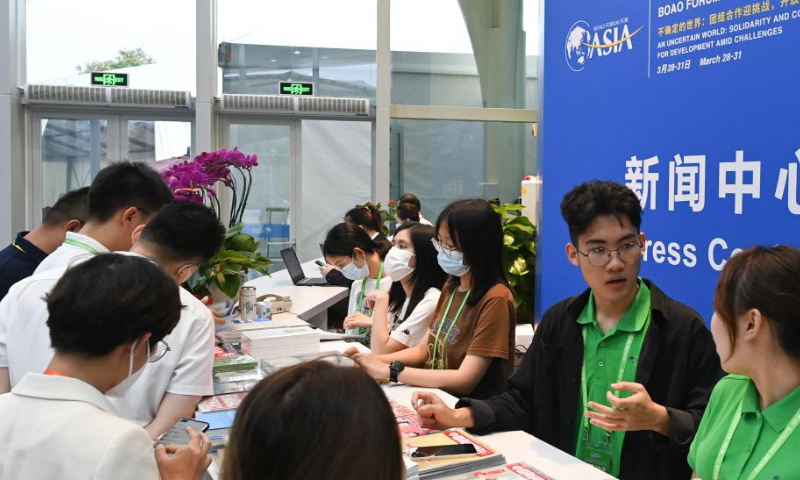 Staff members work at the press center of the Boao Forum for Asia (BFA) Annual Conference 2023 in Boao, south China's Hainan Province, March 27, 2023. The BFA will hold its annual conference from March 28 to 31 in Boao, a coastal town in China's island province of Hainan, according to the official website of the forum.

This year's forum will be held entirely offline under the theme An Uncertain World: Solidarity and Cooperation for Development amid Challenges. (Xinhua/Yang Guanyu)