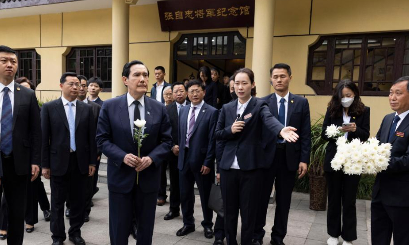 Ma Ying-jeou, former chairman of the Chinese Kuomintang (KMT) party, visits a cemetery dedicated to General Zhang Zizhong, a senior officer killed during the Chinese People's War of Resistance Against Japanese Aggression, and pays tribute to fallen heroes during the war, in southwest China's Chongqing Municipality, April 4, 2023. (Xinhua)