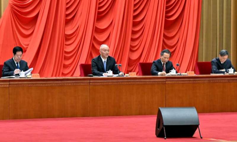 A working conference on the education campaign on the study and implementation of the Thought on Socialism with Chinese Characteristics for a New Era is held in Beijing, capital of China, April 3, 2023. Cai Qi, a member of the Standing Committee of the Political Bureau of the Communist Party of China Central Committee and chief of a central leading group for the campaign, delivered a concluding speech. (Xinhua)