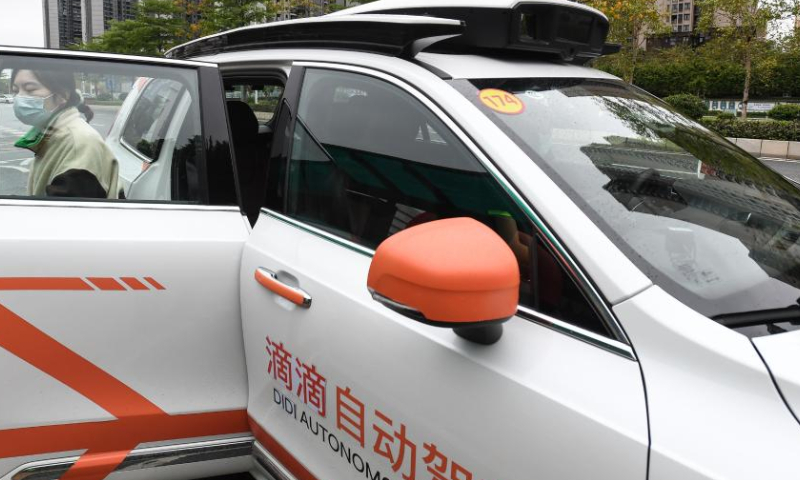 Multiple sensors are installed on top of a Didi autonomous driving vehicle in Huadu District of Guangzhou, south China's Guangdong Province, March 27, 2023. The first batch of Didi autonomous driving vehicles started commercialized demonstration operation here on Monday. Passengers can place an order to book vehicles in the Didi Robotaxi applet, experience autonomous driving service, and pay according to the actual mileage and duration of use. (Xinhua/Liu Dawei)