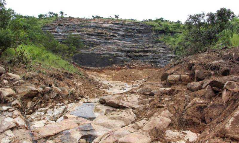 This photo taken on April 1, 2023 shows the path of Cyclone Freddy-induced mudslides in Chiradzulu, Malawi. The cyclone, which hit the southern part of the country hard from the night of March 12, also left about 2,000 people injured, and 650,000 people displaced. (Photo by Roy Nkosi/Xinhua)