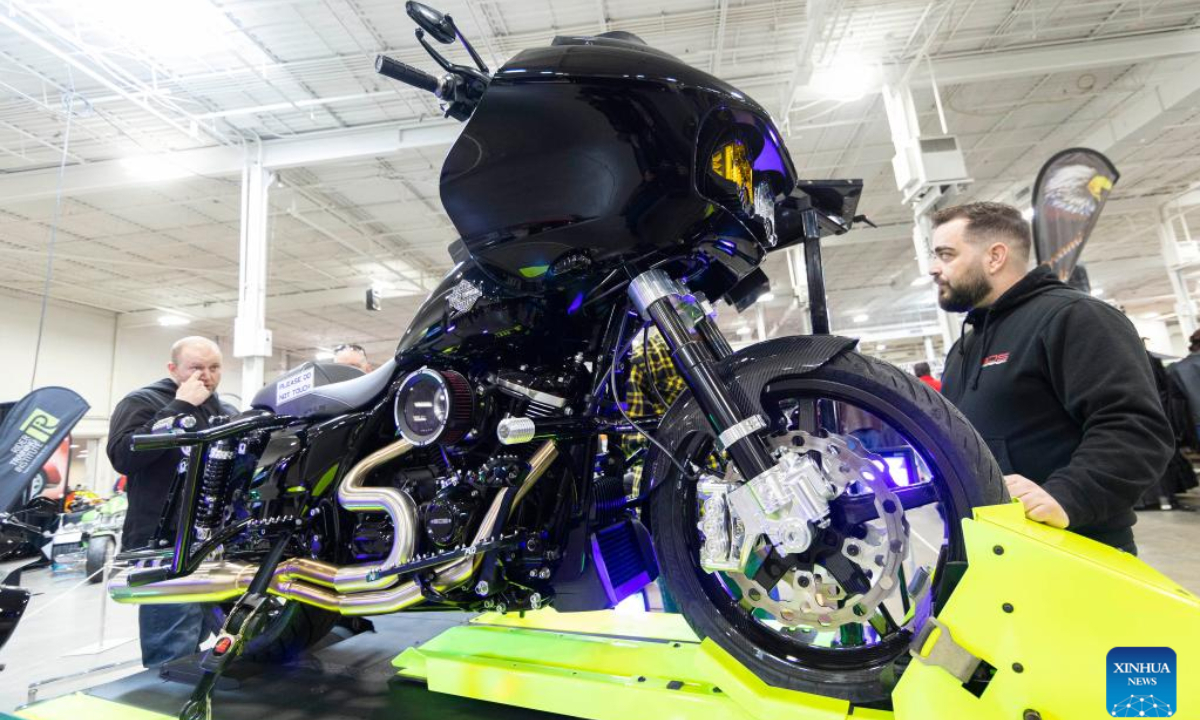 People look at a custom motorcycle during the 2023 Toronto International Spring Motorcycle Show in Mississauga, the Greater Toronto Area, Canada, on April 2, 2023. Photo:Xinhua