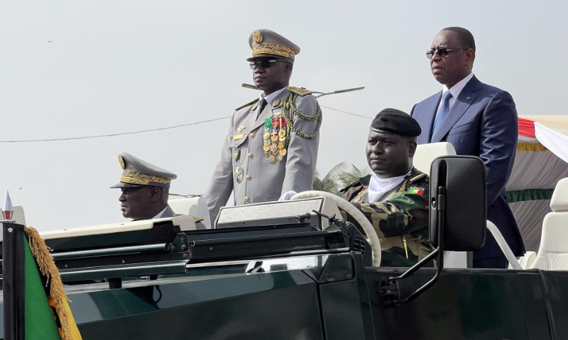 Senegalese President Macky Sall (1st R) attends a military parade in Dakar, Senegal, on April 4, 2023. Senegal marked its 63rd anniversary of independence with a military parade on Tuesday. (Photo by Matar Ndoye/Xinhua)