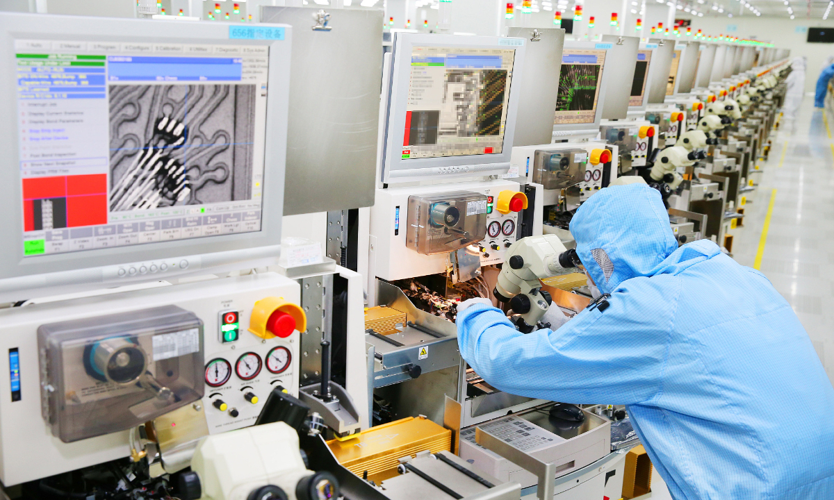 An engineer analyzes chips at a chip factory in Nantong, East China's Jiangsu Province in February. Photo: VCG