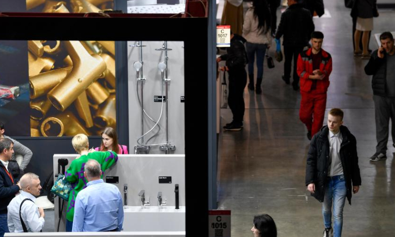 People visit MosBuild, the 28th International Building and Interiors Trade Show, at Crocus Expo International Exhibition Center in Moscow, Russia, on March 28, 2023. The MosBuild is held here from March 28 to March 31. (Photo by Alexander Zemlianichenko Jr/Xinhua)
