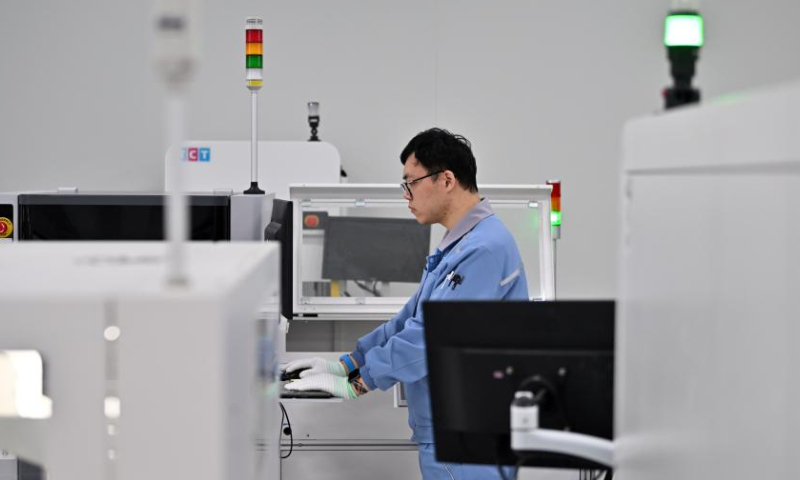 An employee works at a workshop of Traffic Control Technology Equipment Co., Ltd. in Wuqing District, north China's Tianjin, April 3, 2023. The Traffic Control Technology Equipment Co., Ltd. in north China's Tianjin is seeing a continuous increase in order volume this year. Inside the factory, dozens of machines are running at full capacity, and rows of circuit boards for the train operation control system are waiting to be delivered after rolling off automatic production lines.

Headquartered in Beijing, the enterprise officially went into production in 2020. It has reduced the operation cost by about 30% thanks to the supportive polices provided by the coordinated development of the Beijing-Tianjin-Hebei region. (Xinhua/Li Ran)
