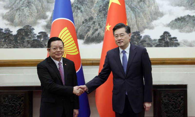 Chinese State Councilor and Foreign Minister Qin Gang (right) meets with ASEAN Secretary-General Kao Kim Hourn in Beijing on Monday. Photo: fmprc.gov.cn