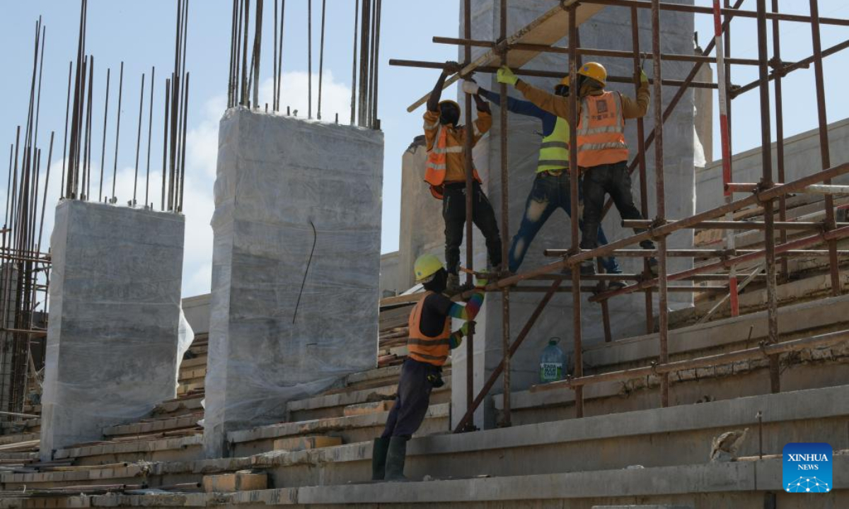 Construction workers are engaged in a China-financed rehabilitation project at the Leopold Sedar Senghor Stadium in Dakar, Senegal, March 22, 2023. Photo:Xinhua