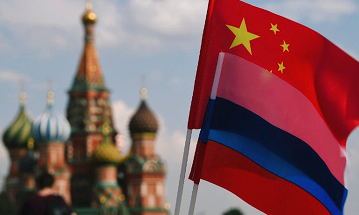 The national flags of China and Russia are seen on Red Square, Moscow. Photo: Xinhua