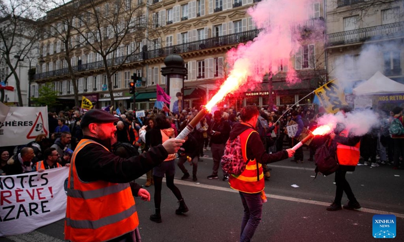 People participate in a protest against a pension reform bill in Paris, France, on March 23, 2023. Over 1 million people in France joined nationwide protests on Thursday, rejecting the government's proposed pension reform bill that would raise the retirement age from 62 to 64, French ministry of the interior said on Thursday evening.(Photo: Xinhua)