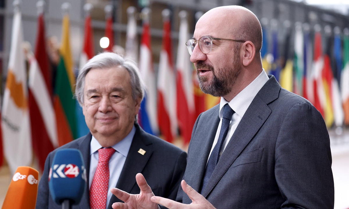 UN Secretary-General António Guterres (left) and President of the European Council Charles Michel speak on arrival for an EU Summit in Brussels, on March 23, 2023. The summit aims to build on previous European Council meetings where EU leaders will discuss EU's policy on Ukraine among other issues. Photo: AFP