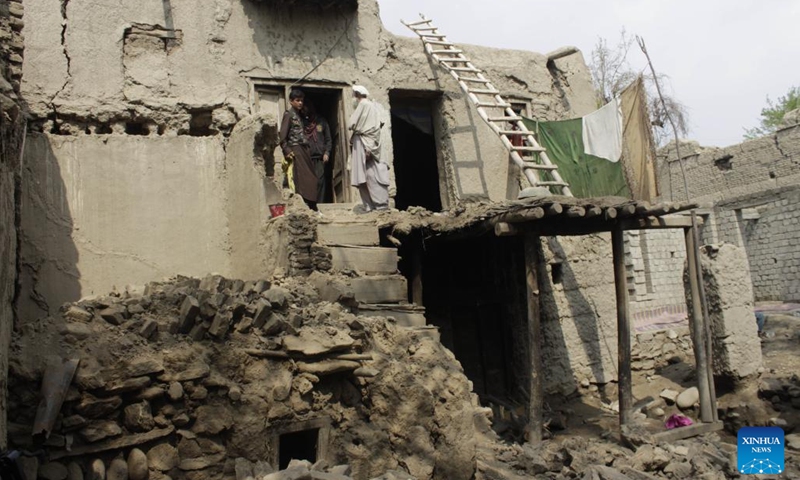 People check a damaged house after an earthquake in Laghman province, Afghanistan, March 22, 2023.(Photo: Xinhua)