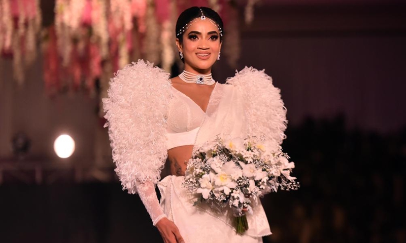 A model presents a creation during a wedding show in Colombo, Sri Lanka, on March 21, 2023. (Photo: Xinhua)