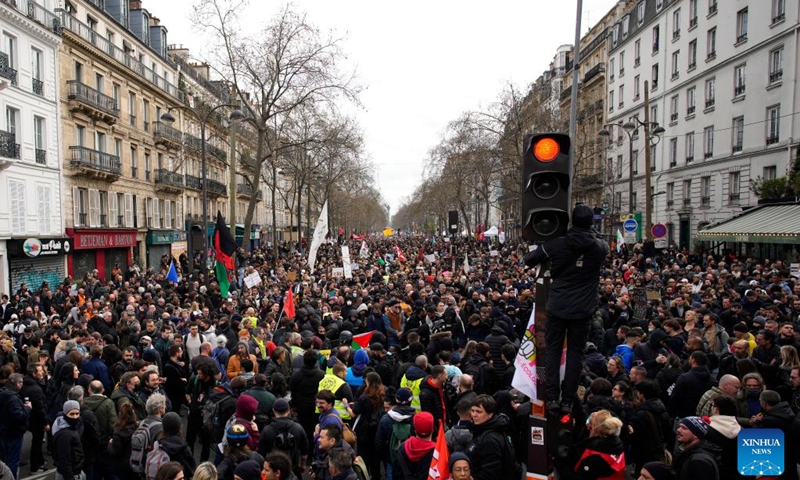People participate in a protest against a pension reform bill in Paris, France, on March 23, 2023. Over 1 million people in France joined nationwide protests on Thursday, rejecting the government's proposed pension reform bill that would raise the retirement age from 62 to 64, French ministry of the interior said on Thursday evening.(Photo: Xinhua)