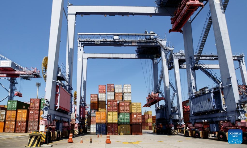 This photo taken on March 20, 2023 shows a container terminal at Rio de Janeiro Port in Brazil. Established in the early 20th century, Rio de Janeiro Port is one of the important seaports for goods import and export in Brazil, playing a significant role in the country's economic and trade development. (Photo by Claudia Martini/Xinhua)