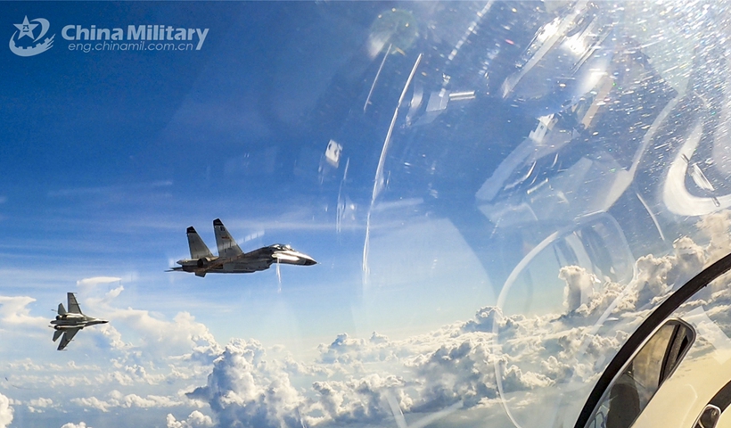 Fighter jets attached to a naval aviation brigade under the PLA Southern Theater Command fly in formation during a day-and-night flight training exercise in early March, 2023. (eng.chinamil.com.cn/Photo by Fu Jinquan)