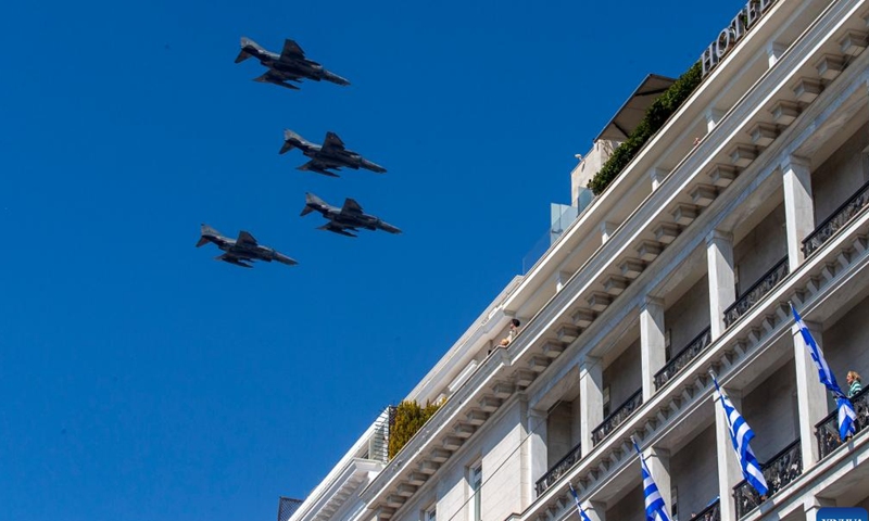 Fighter jets fly during a military parade commemorating the Greek Independence Day in Athens, Greece, March 25, 2023. (Xinhua/Marios Lolos)