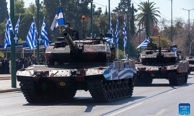 Military vehicles attend a military parade commemorating the Greek Independence Day in Athens, Greece, March 25, 2023. (Xinhua/Marios Lolos)