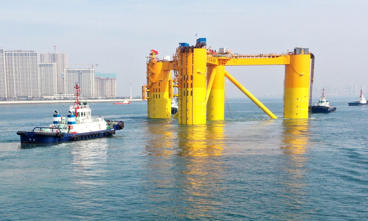 China's first deep-sea floating wind power turbine platform built by CNOOC Photo：VCG