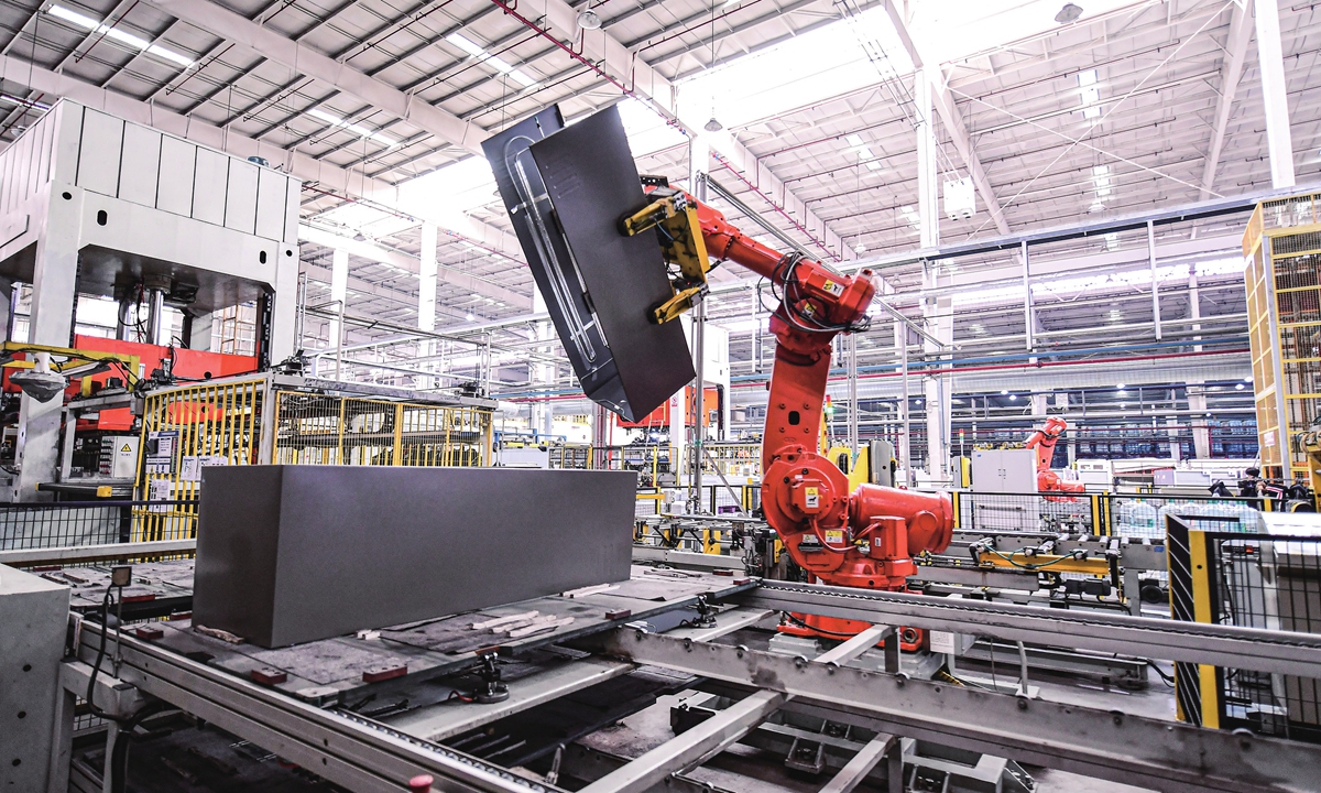 Manipulators are used to produce refrigerators on a production line of a manufacturing enterprise in Shenyang, Northeast China's Liaoning Province on March 27, 2023. The company's products are sold to Beijing, Tianjin, Tangshan and other cities in China, with an annual output of more than 1 million refrigerators. Photo: VCG