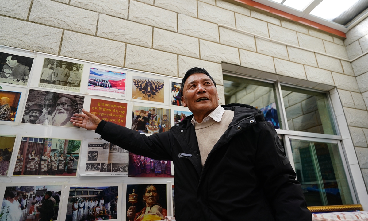 Puciren showcases historic photos of reforms and development in Xizang on March 23, 2023. Photo: Fan Wei/GT