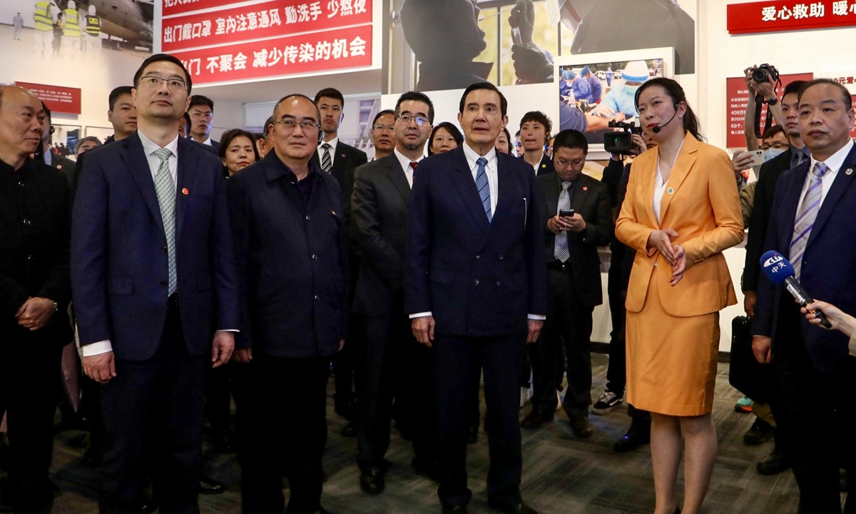 During his long-awaited trip to the Chinese mainland, the former chairperson of the Chinese Kuomintang party Ma Ying-jeou visits an exhibition on Wuhan's battle against the COVID-19 epidemic on March 30, 2023 and pays tribute to medical workers for their sacrifice and dedication. Photo: VCG