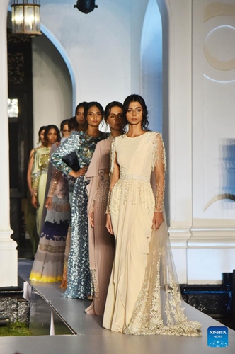 Models present creations during the Colombo Fashion Week in Colombo, Sri Lanka, March 29, 2023.(Photo: Xinhua)