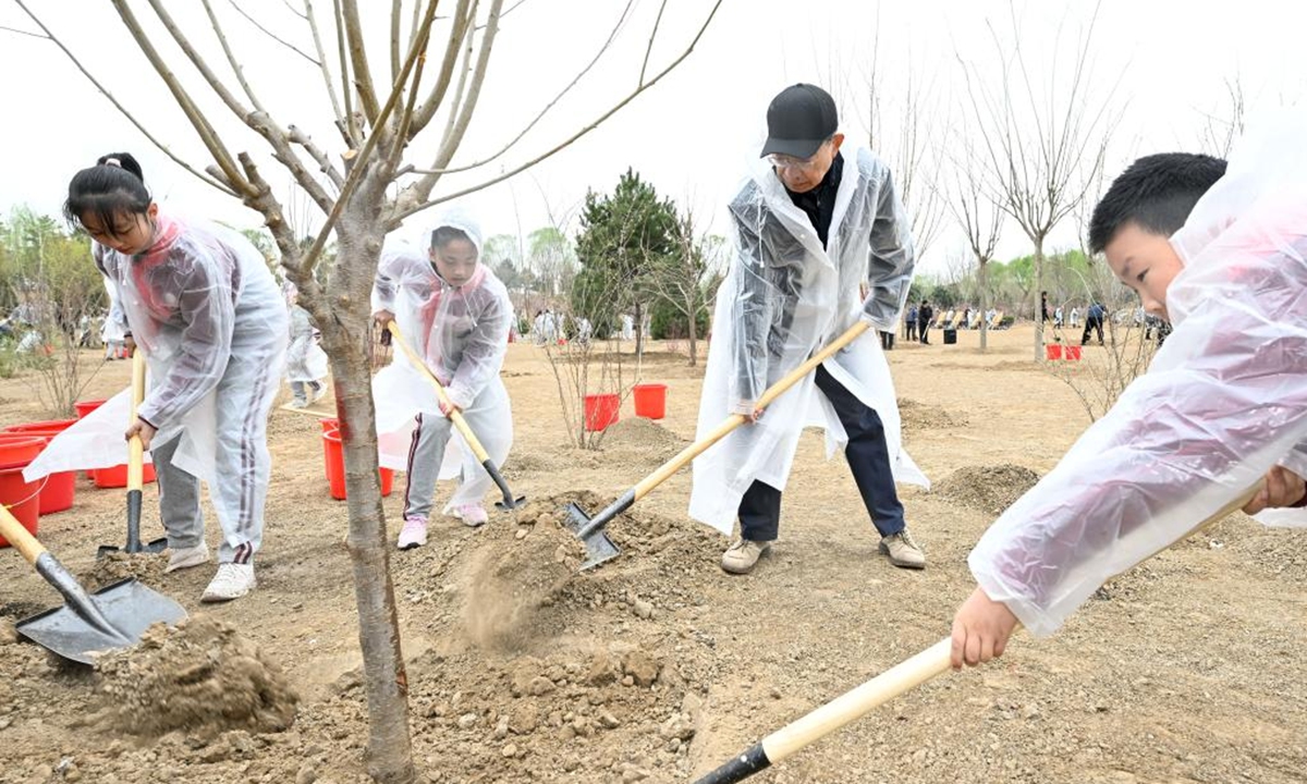 Zhao Leji plants a tree during a voluntary tree planting activity in Chaoyang District in Beijing, capital of China, April 4, 2023. Party and state leaders Xi Jinping, Li Qiang, Zhao Leji, Wang Huning, Cai Qi, Ding Xuexiang, Li Xi, and Han Zheng, planted trees with local people at a city park in the eastern district of Chaoyang in the spring shower. (Xinhua)