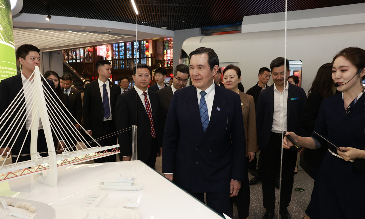 Former chairperson of the Chinese Kuomintang (KMT) party Ma Ying-jeou visits the Chongqing Urban Planning Exhibition Hall in Southwest China's Chongqing Municipality on April 3, 2023. Photo: VCG