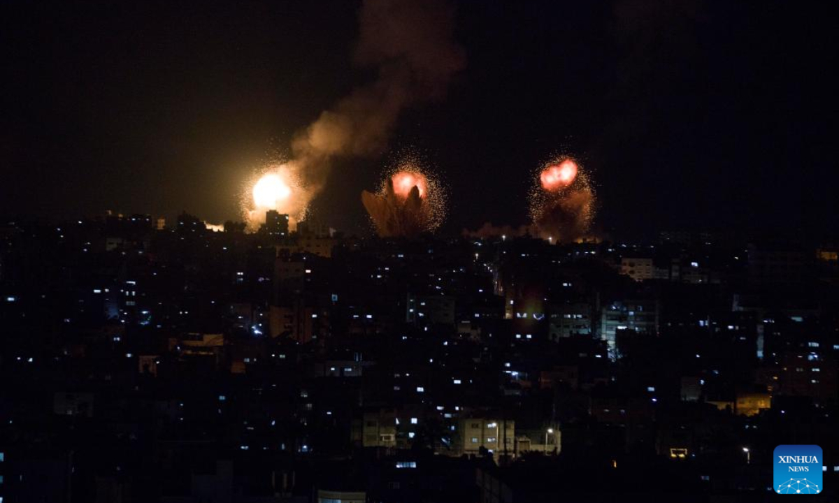 Fire and smoke are seen following an Israeli airstrike in the southern Gaza Strip city of Khan Younis on April 7, 2023. Israel on Friday intensified airstrikes on military posts in the Gaza Strip and Lebanon, in response to rockets fired from the areas at several parts in Israel, escalating tensions with Palestine over the past three days after Israeli police forcibly expelled Palestinian worshippers from the Al-Aqsa Mosque in East Jerusalem. Photo:Xinhua