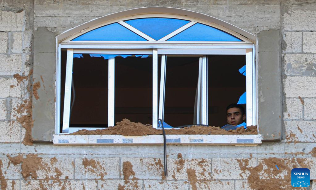 A man checks damages caused by an Israeli airstrike in Gaza City April 7, 2023. Israel on Friday intensified airstrikes on military posts in the Gaza Strip and Lebanon, in response to rockets fired from the areas at several parts in Israel, escalating tensions with Palestine over the past three days after Israeli police forcibly expelled Palestinian worshippers from the Al-Aqsa Mosque in East Jerusalem. Photo:Xinhua