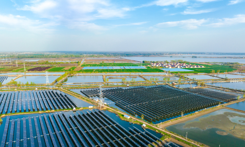 Solar panels are arrayed over a modern fishery industrial park in Donghai county, East China's Jiangsu Province, on April 9, 2023. Donghai has made full use of wasteland, river and lake shores and rooftops to build photovoltaic power generation projects, which helped increase farmers' incomes and contributed to rural revitalization. Photo: cnsphoto
