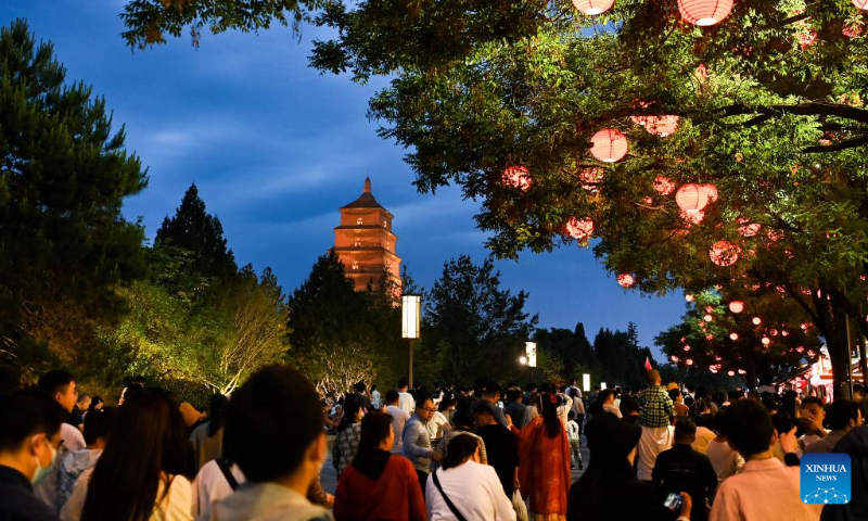 People visit the Dayan Pagoda scenic spot in Xi'an, capital of northwest China's Shaanxi Province, May 1, 2023. China has witnessed a travel boom during this year's five-day May Day holiday. (Photo by Zou Jingyi/Xinhua)